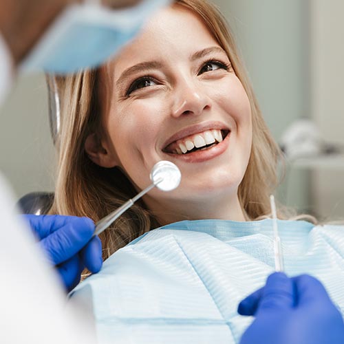 young women at a dental exam in Brampton